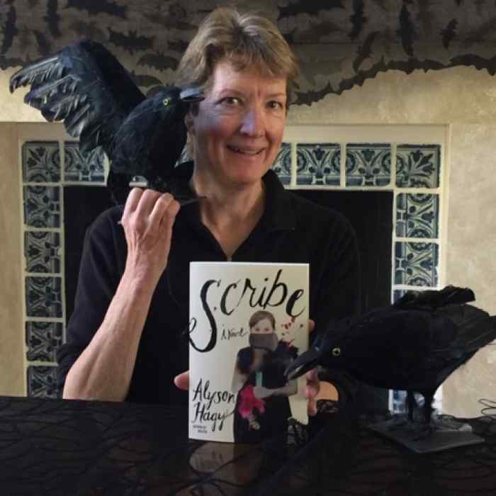 Alyson Hagy holding her book Scribe