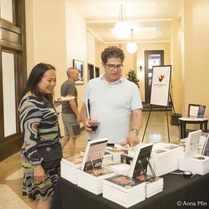 Book browsers at a Graywolf event