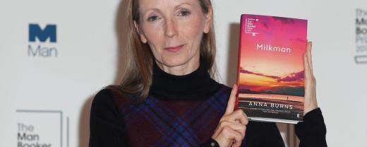 Anna Burns holding her book Milkman